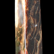 Chocolate Calcite obelisk 120*33*32mm 332g in sunlight - Rocks and Things Store