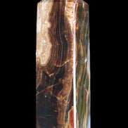 Chocolate Calcite obelisk 120*33*32mm 332g in sunlight - Rocks and Things Store
