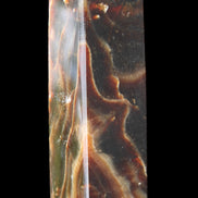 Chocolate Calcite obelisk 120*33*32mm 332g in sunlight - Rocks and Things Store