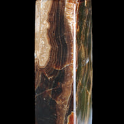 Chocolate Calcite obelisk 120*33*32mm 332g in sunlight - Rocks and Things Store