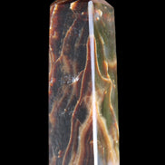 Chocolate Calcite obelisk 120*33*32mm 332g in sunlight - Rocks and Things Store