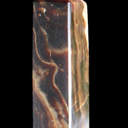 Chocolate Calcite obelisk 120*33*32mm 332g in sunlight - Rocks and Things Store