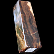 Chocolate Calcite obelisk 120*33*32mm 332g in sunlight - Rocks and Things Store