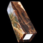 Chocolate Calcite obelisk 120*33*32mm 332g in sunlight - Rocks and Things Store
