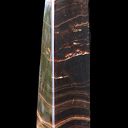 Chocolate Calcite obelisk 128*35*32mm 301g in sunlight - Rocks and Things Store