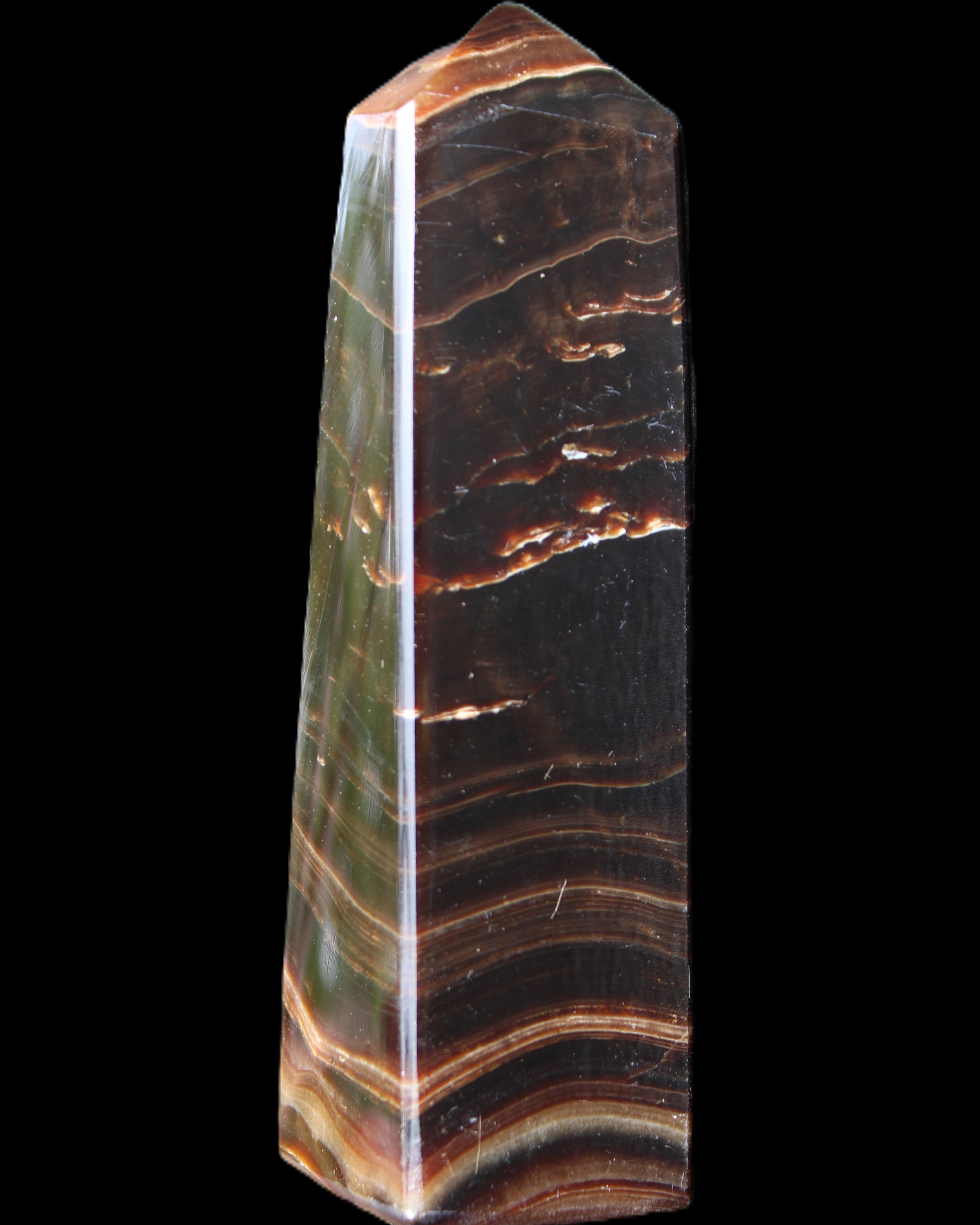 Chocolate Calcite obelisk 128*35*32mm 301g in sunlight - Rocks and Things Store