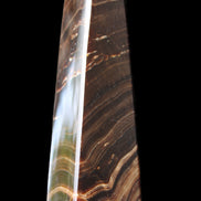 Chocolate Calcite obelisk 128*35*32mm 301g in sunlight - Rocks and Things Store