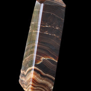Chocolate Calcite obelisk 128*35*32mm 301g in sunlight - Rocks and Things Store