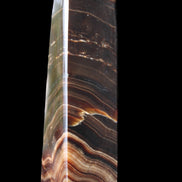 Chocolate Calcite obelisk 128*35*32mm 301g in sunlight - Rocks and Things Store