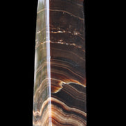 Chocolate Calcite obelisk 128*35*32mm 301g in sunlight - Rocks and Things Store