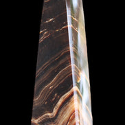 Chocolate Calcite obelisk 128*35*32mm 301g in sunlight - Rocks and Things Store