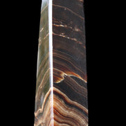 Chocolate Calcite obelisk 128*35*32mm 301g in sunlight - Rocks and Things Store