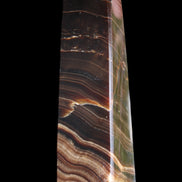 Chocolate Calcite obelisk 128*35*32mm 301g in sunlight - Rocks and Things Store