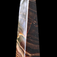 Chocolate Calcite obelisk 128*35*32mm 301g in sunlight - Rocks and Things Store