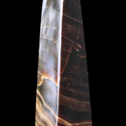 Chocolate Calcite obelisk 128*35*32mm 301g in sunlight - Rocks and Things Store