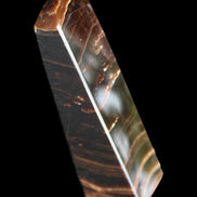 Chocolate Calcite obelisk 128*35*32mm 301g in sunlight - Rocks and Things Store