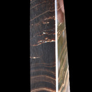 Chocolate Calcite obelisk 128*35*32mm 301g in sunlight - Rocks and Things Store