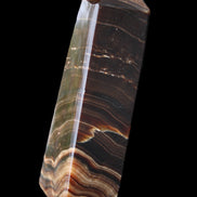 Chocolate Calcite obelisk 128*35*32mm 301g in sunlight - Rocks and Things Store