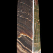 Chocolate Calcite obelisk 128*35*32mm 301g in sunlight - Rocks and Things Store