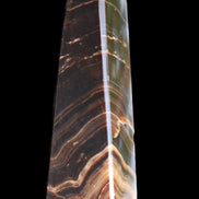 Chocolate Calcite obelisk 128*35*32mm 301g in sunlight - Rocks and Things Store