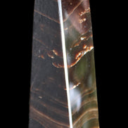 Chocolate Calcite obelisk 128*35*32mm 301g in sunlight - Rocks and Things Store
