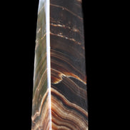 Chocolate Calcite obelisk 128*35*32mm 301g in sunlight - Rocks and Things Store