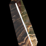 Chocolate Calcite obelisk 128*35*32mm 301g in sunlight - Rocks and Things Store