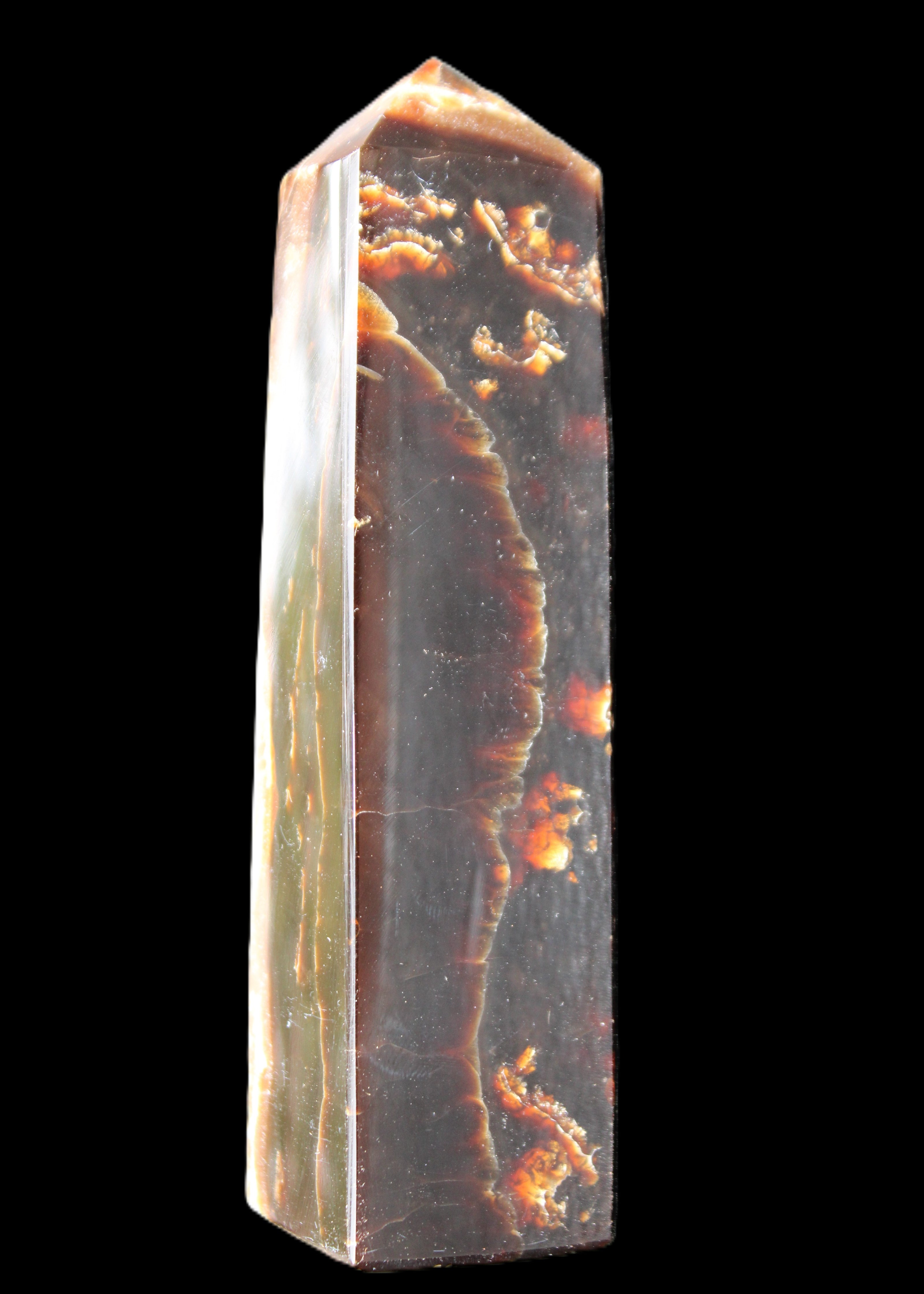 Chocolate Calcite obelisk 132*30*28mm 282g in sunlight - Rocks and Things Store