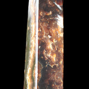 Chocolate Calcite obelisk 132*30*28mm 282g in sunlight - Rocks and Things Store