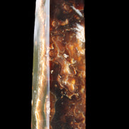 Chocolate Calcite obelisk 132*30*28mm 282g in sunlight - Rocks and Things Store