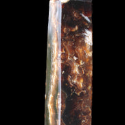 Chocolate Calcite obelisk 132*30*28mm 282g in sunlight - Rocks and Things Store