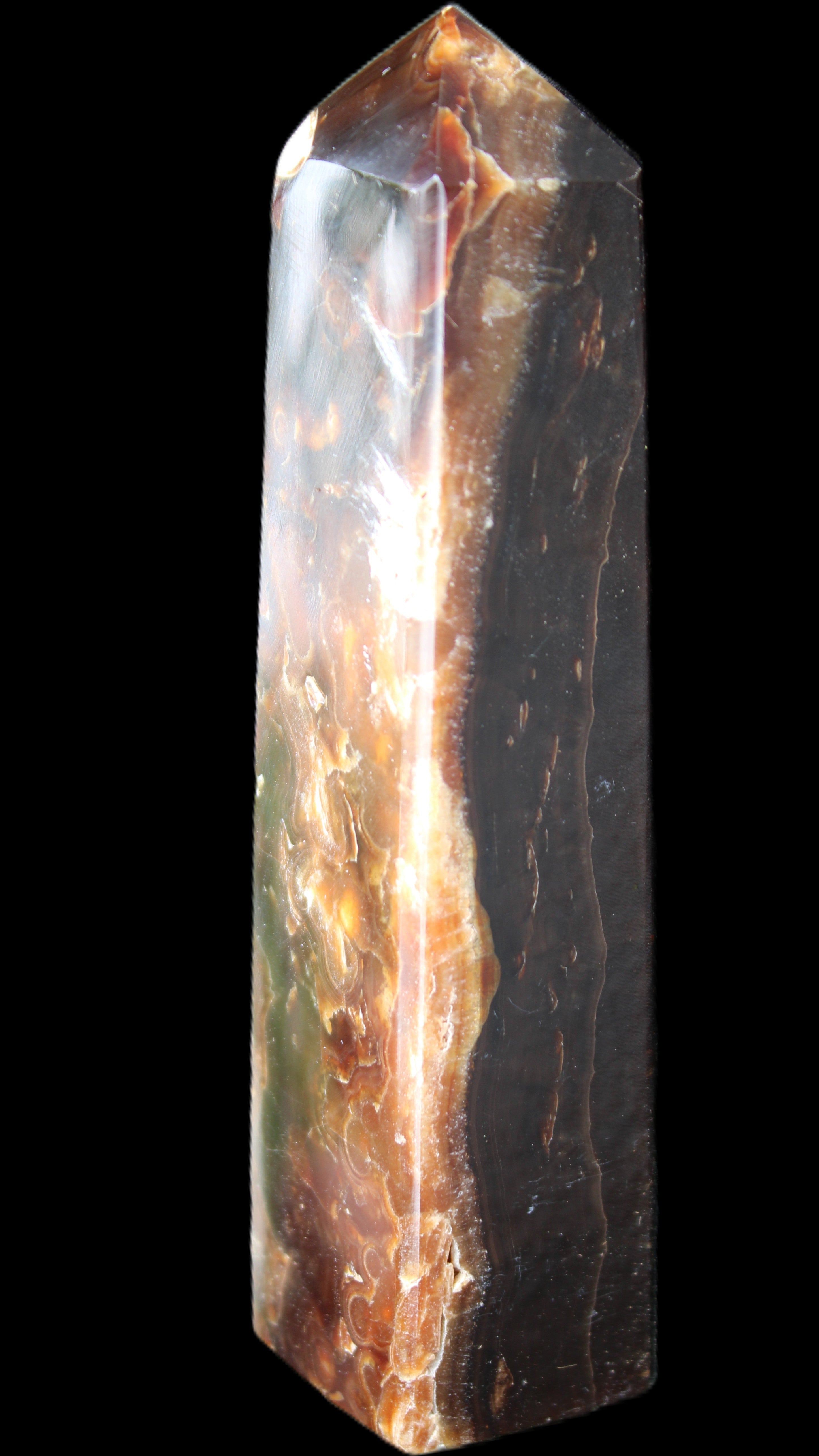 Chocolate Calcite obelisk 132*30*28mm 282g in sunlight - Rocks and Things Store