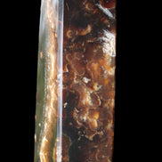 Chocolate Calcite obelisk 132*30*28mm 282g in sunlight - Rocks and Things Store