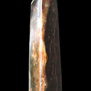 Chocolate Calcite obelisk 132*30*28mm 282g in sunlight - Rocks and Things Store