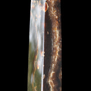 Chocolate Calcite obelisk 132*30*28mm 282g in sunlight - Rocks and Things Store