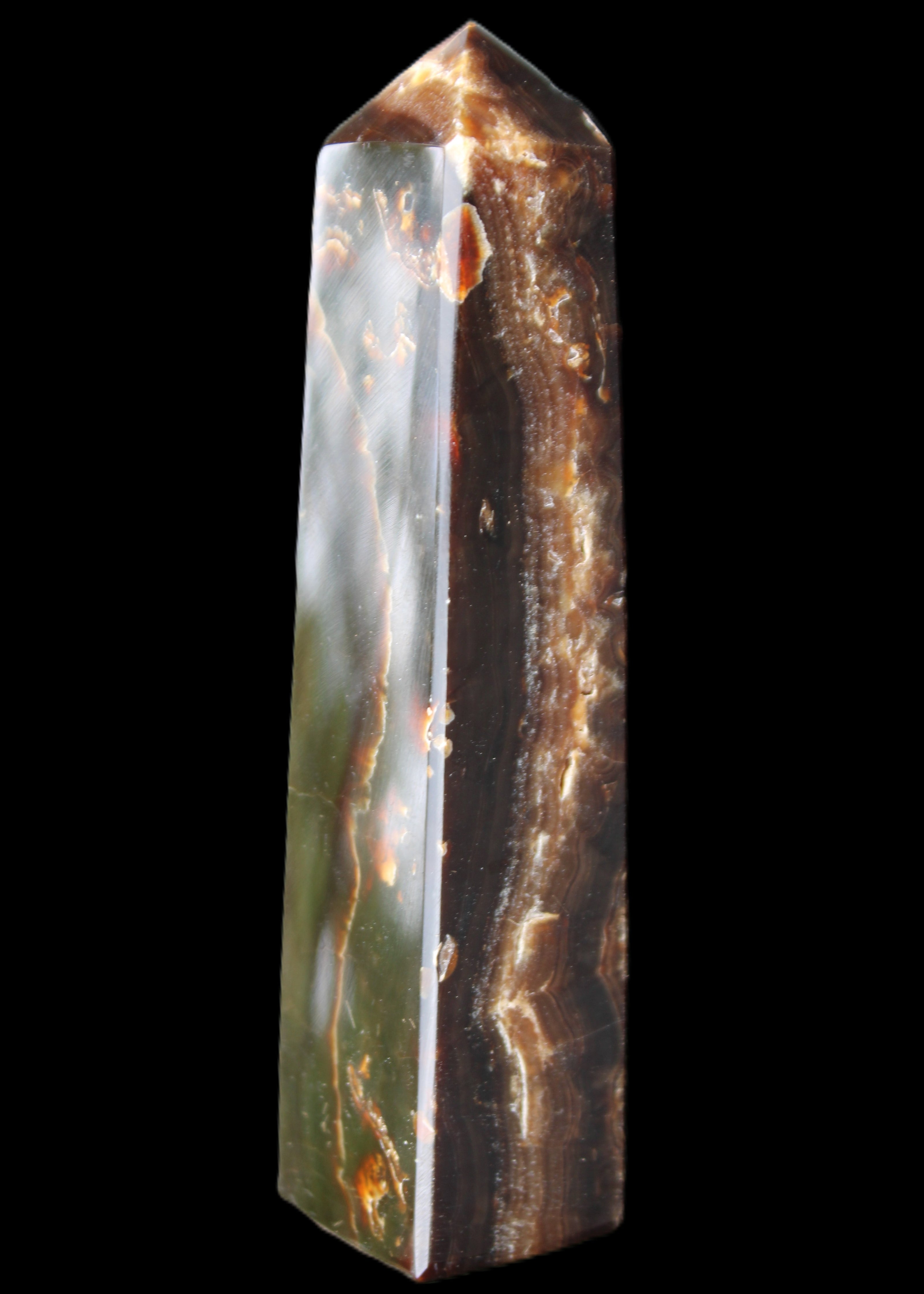 Chocolate Calcite obelisk 132*30*28mm 282g in sunlight - Rocks and Things Store