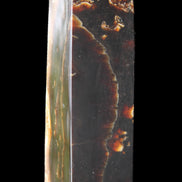 Chocolate Calcite obelisk 132*30*28mm 282g in sunlight - Rocks and Things Store