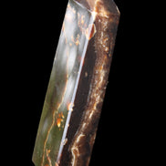Chocolate Calcite obelisk 132*30*28mm 282g in sunlight - Rocks and Things Store
