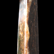 Chocolate Calcite obelisk 132*30*28mm 282g in sunlight - Rocks and Things Store