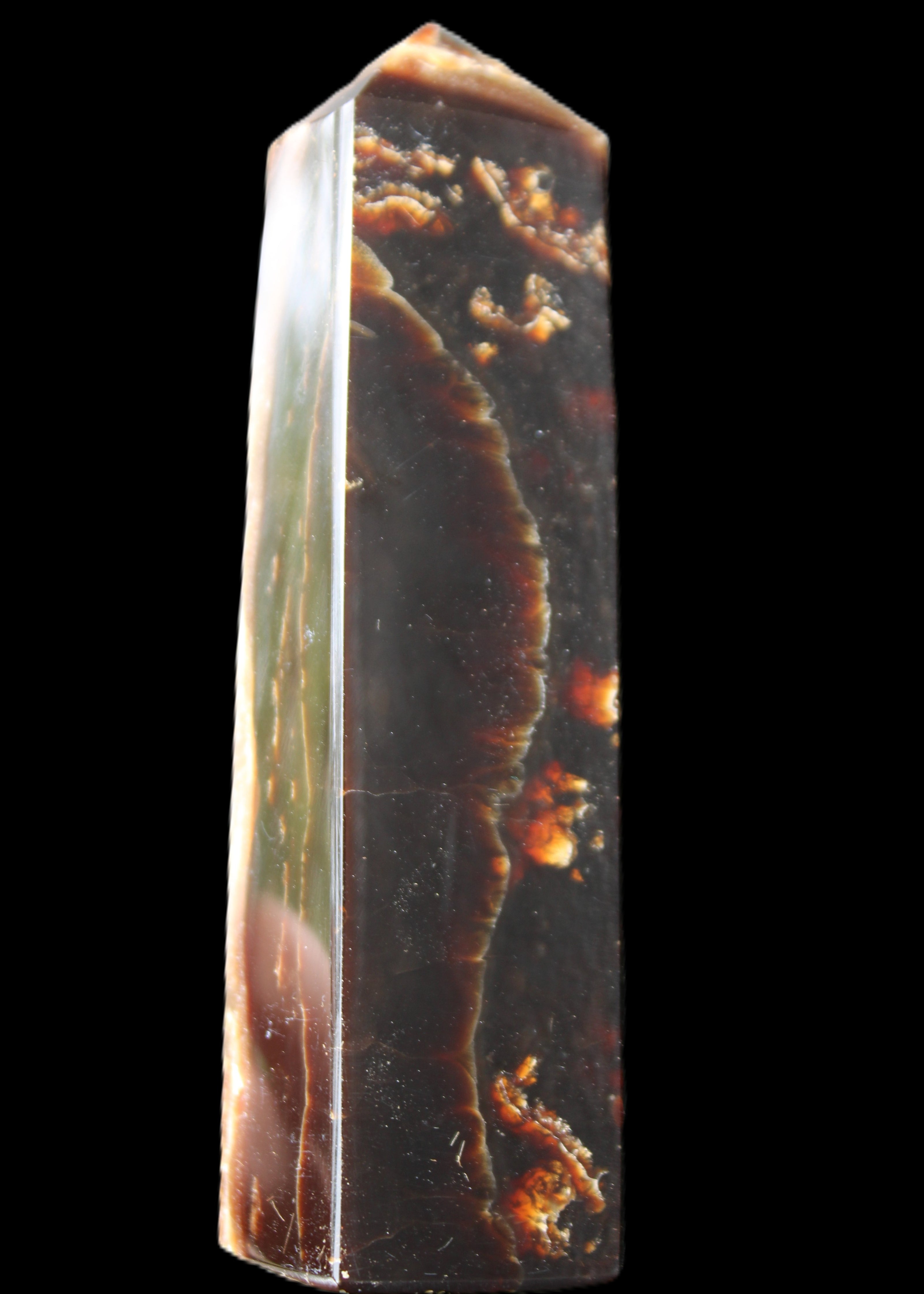 Chocolate Calcite obelisk 132*30*28mm 282g in sunlight - Rocks and Things Store