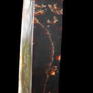 Chocolate Calcite obelisk 132*30*28mm 282g in sunlight - Rocks and Things Store