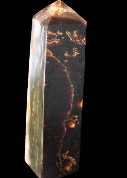 Chocolate Calcite obelisk 132*30*28mm 282g in sunlight - Rocks and Things Store