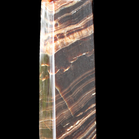 Chocolate Calcite obelisk 113*33*21mm 201g in sunlight - Rocks and Things Store