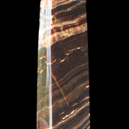 Chocolate Calcite obelisk 113*33*21mm 201g in sunlight - Rocks and Things Store