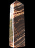 Chocolate Calcite obelisk 113*33*21mm 201g in sunlight - Rocks and Things Store