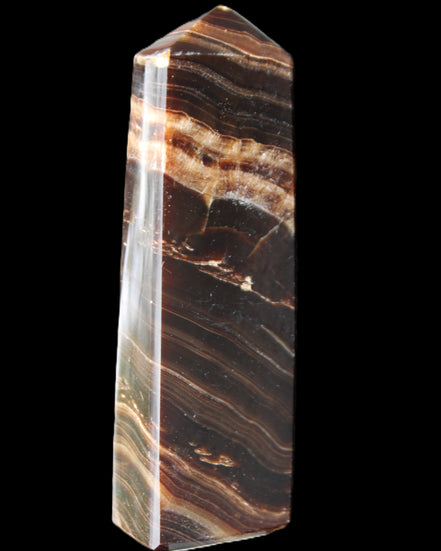 Chocolate Calcite obelisk 113*33*21mm 201g in sunlight - Rocks and Things Store