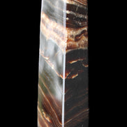 Chocolate Calcite obelisk 113*33*21mm 201g in sunlight - Rocks and Things Store