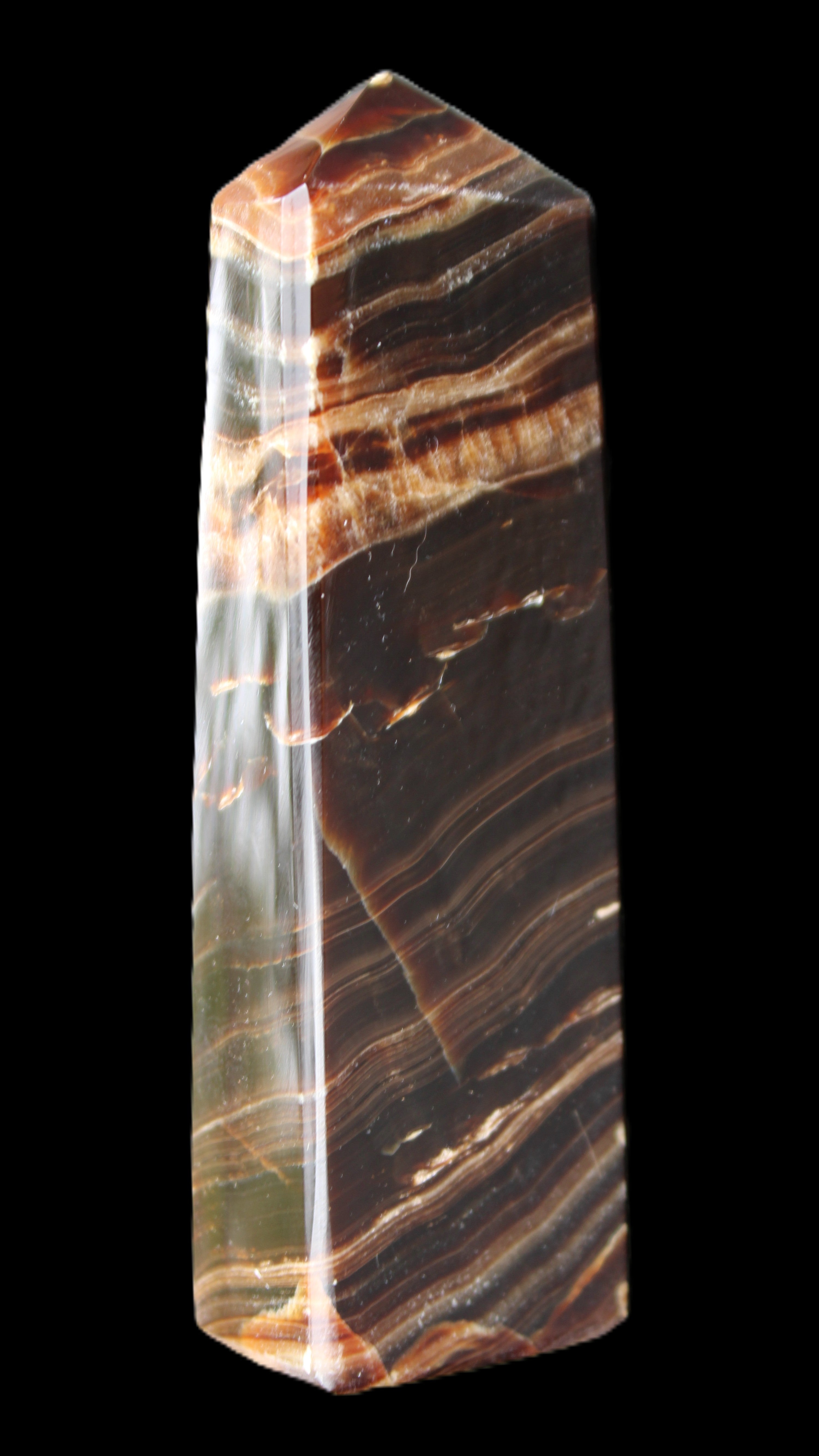 Chocolate Calcite obelisk 113*33*21mm 201g in sunlight - Rocks and Things Store