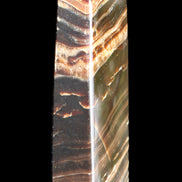 Chocolate Calcite obelisk 113*33*21mm 201g in sunlight - Rocks and Things Store