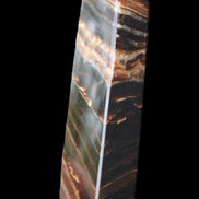 Chocolate Calcite obelisk 113*33*21mm 201g in sunlight - Rocks and Things Store